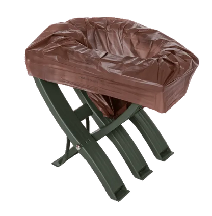 Photo of the BioBag boitoi product in use - a brown compostable bag on a plastic stool used as a toilet with camping or hiking