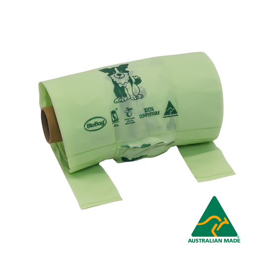 Roll of green compostable dog waste bags with a visible 'Australian Made' logo on a white background