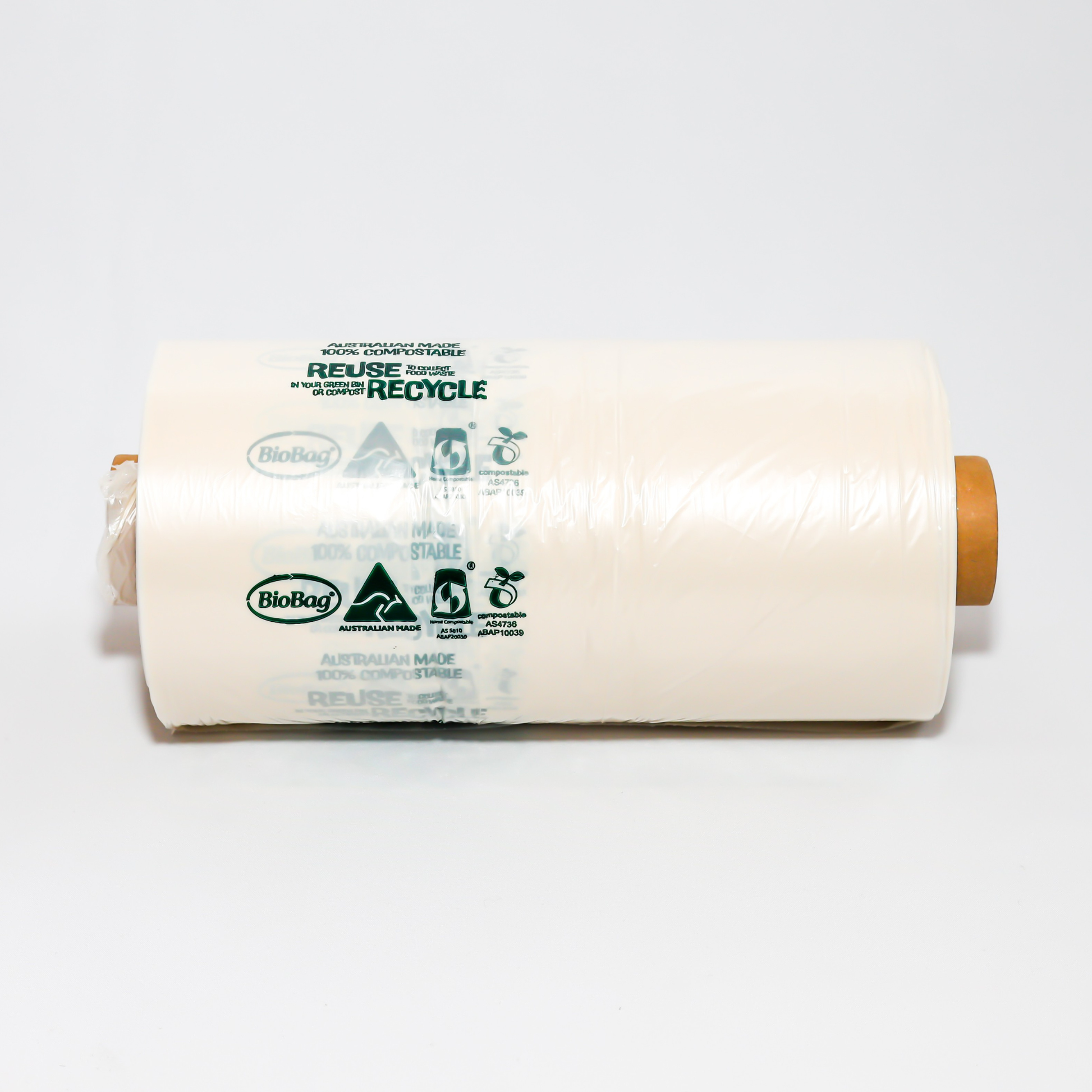 Roll of BioBag biodegradable food produce bags with recycling symbols on a white background
