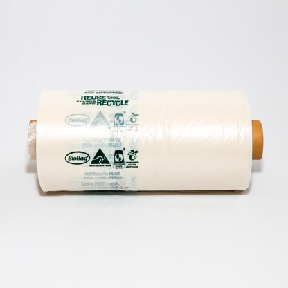 Roll of BioBag biodegradable food produce bags with recycling symbols on a white background