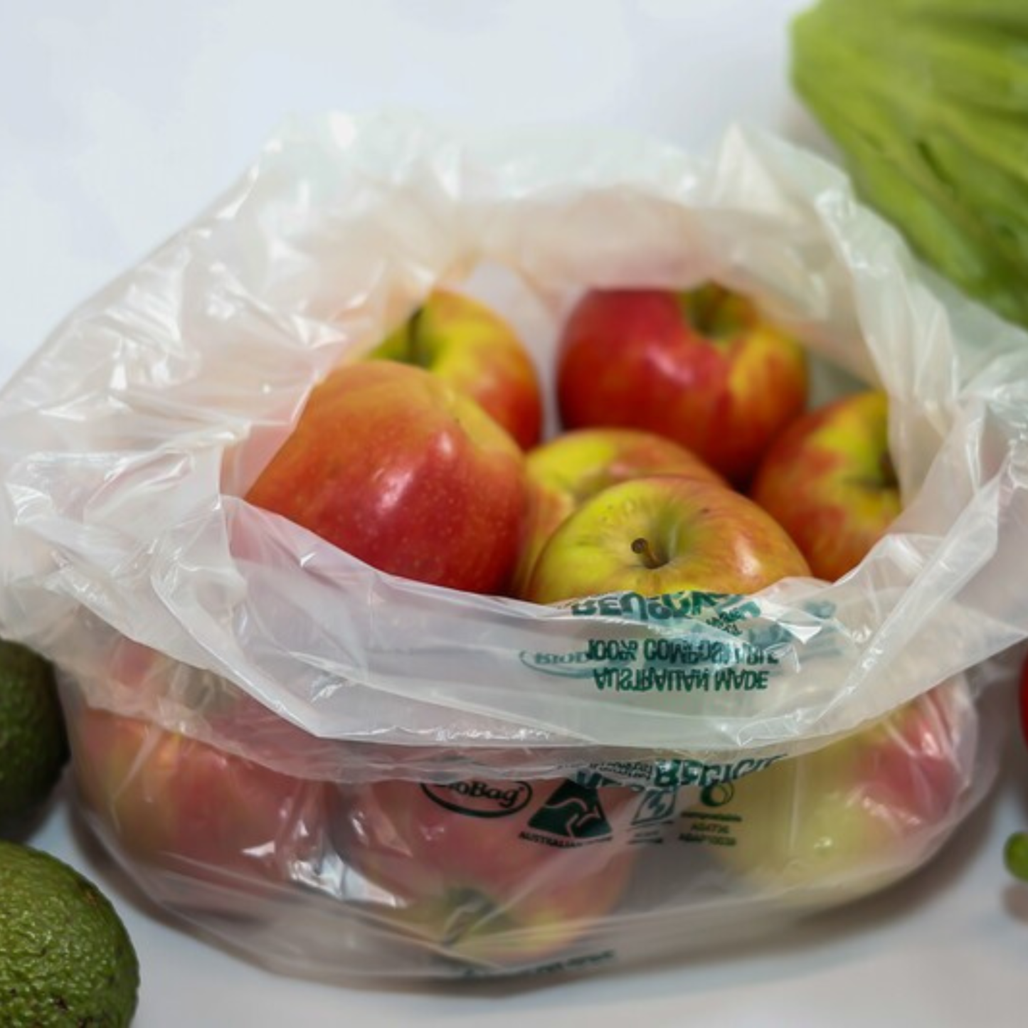Bag of red apples in a Biobag compostable produce bag
