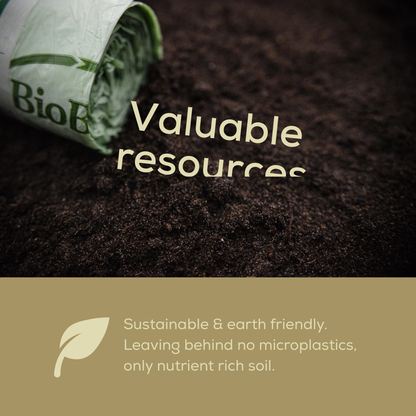 Roll of compostable bags laying on soil with text about sustainability and eco-friendliness on a brown background